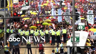 Protestors march through the streets of Hong Kong