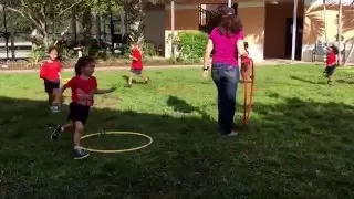 Musical chairs with hula hoops field day December 14, 2015