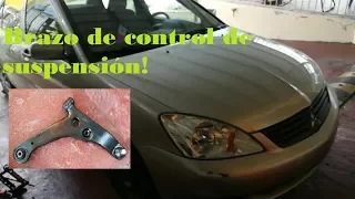 Instalación de brazo de suspensión Mitsubishi Lancer 02-07.