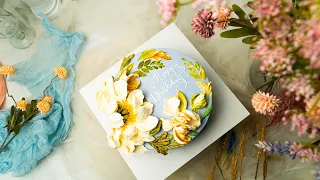 Beautifully Decorated Cake With Ornaments Flying And Piping Flowers Directly On The Cake