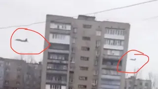 Russian Su-25 attack aircraft fly at low altitude over Donetsk.