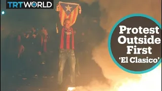 Protesters clash with police outside Barcelona stadium