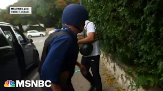 NBC News team takes cover from mortar fire