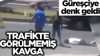 TRAFİKTE KÜNDE YAPAN GÜREŞÇİ