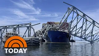 Demolition crews begin cutting into Baltimore bridge wreckage