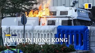 Fires burn in Hong Kong as protesters clash with police