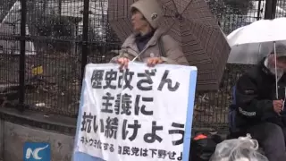 Japanese citizens demand PM face history