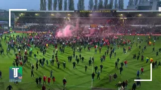 WATCH: Wrexham fans CAN'T CONTAIN excitement after PROMOTION to Football League and INVADE the pitch