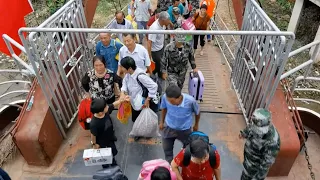 Militias relocate residents in east China's flood-hit Jiangxi Province