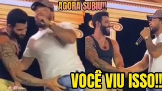 VOCÊ VIU ISSO!! Gusttavo Lima agarra as partes íntimas de cantor em show: 'Agora subiu'.