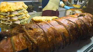 Street Food from Umbria. Huge Porchetta Cut for Giant Stuffed Sandwiches. Seen in Italy