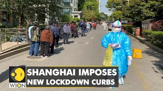Residents stock up food supplies as Shanghai imposes new COVID lockdown curbs | English News | WION