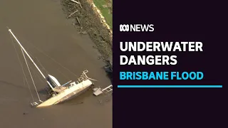 Brisbane River remains 'no-go zone' with tonnes of debris under the surface | ABC News