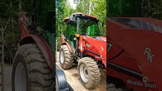stump removal with  a rural king rk37 tractor and backhoe. did a awesome job