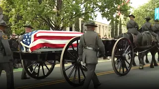 Caisson carries body of fallen Charlotte police officer to church