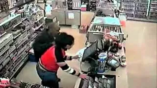 Woman Cashier Terrorized By Armed Robber CCTV