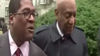 Bill Cosby dances out of court