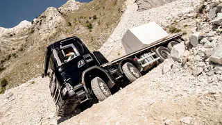 Driving an 8x8 Scania G 500 XT with 24 tonnes of marble on steep mountain roads in Carrara, Italy