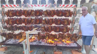 Four Huge Automatic Machines Roast Tons of Pork Ribs. Italy Street Food Event
