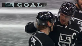 Adrian Kempe swipes the puck from Timo Meier and shoots it across the rink for an empty net goal.