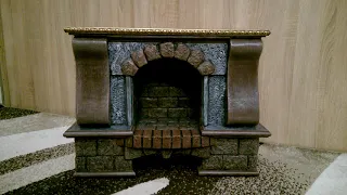 Камин из картона. Имитация деревянных колон. Фальш камин.A fireplace with a grate made of cardboard
