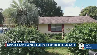 Mysterious land trust behind backyard property dispute once bought a private, dead-end road