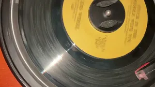 Stealer’s Wheel - “Stuck in the Middle With You” (1972, 45 rpm)