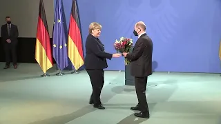 Scholz takes over as German chancellor, ending Merkel era