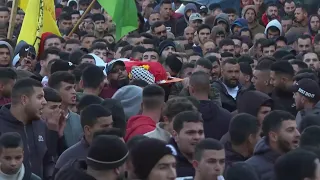 Crowds mourn 18-year-old Palestinian killed during Israeli raid in the West Bank town of Silwad