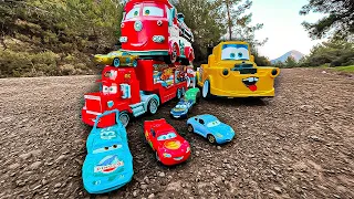 Looking for Disney Pixar Cars On the Rocky Road : Lightning McQueen, Mater, Dinoco McQueen, Mack