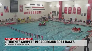 Students compete in cardboard boat races