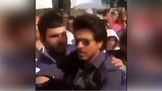 Shahrukh Khan gets angry, pushes away fan in Amsterdam-watch video |Filmibeat