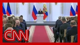 Hear what CNN reporter noticed about crowd watching Putin's speech