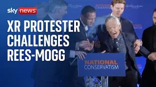 Extinction rebellion: Protester heckles Rees-Mogg at National Conservatism Conference