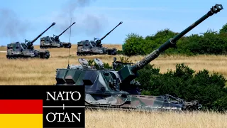 NATO. Powerful howitzers AHS Krab and Panzerhaubitze 2000 on exercises in Germany.