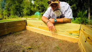 Building raised garden  bed on a hill