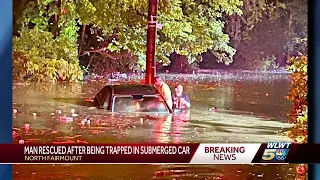 Cincinnati fire crews rescue man from car submerged as flood threat persists Wednesday morning