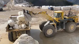 Komatsu WA800 Wheel Loader Loading Caterpillar 775E Dumpers - Birros Quarries