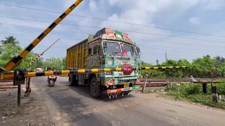 Dangerous Scene Happened Loaded Truck Passing railgate : Poorva Express   Furiously Moving Railyard