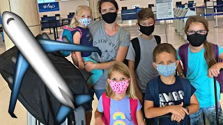Solo Flight with 5 Kids Amidst a Pandemic: Our Family's Adventure!