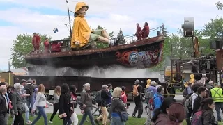 Giant puppets parade through Montreal