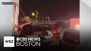 Driver flees after pickup truck lands on parked cars in Brockton