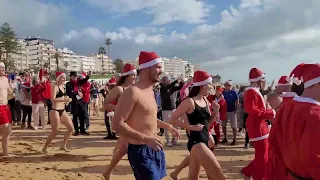 Father Christmas fun sea swim on Christmas day 2022