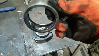 How to get a stuck bearing race out of the housing with a welder