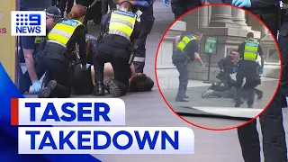 Man Tasered in Melbourne CBD after allegedly threatening people with scissors | 9 News Australia