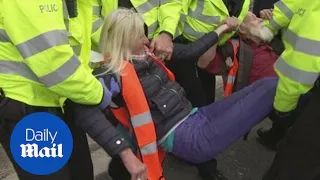 Insulate Britain block London's Old Street roundabout and the M25 as police begin arrests