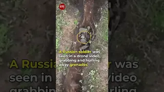 Russian Soldier Casually Hurls Grenade dropped From Ukranian Drone