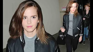 Emma Watson is seen wearing nothing beneath her open jacket.