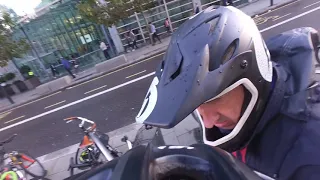 Cutting bike locks with angle grinder on High Holborn