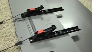 How to mount a TV on a VESA wall mount. Demonstration with a Vogel's Wallmount 2305.